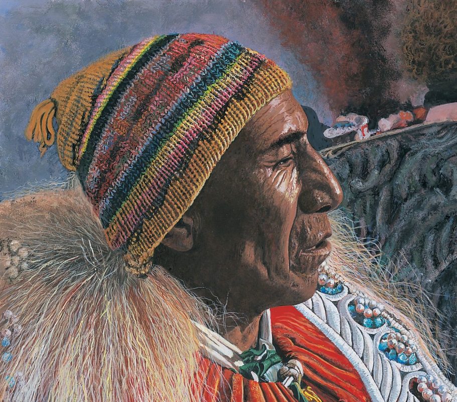Homme en habit traditionnel, regard tourné vers la gauche, avec un chapeau coloré.